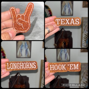 Puede incluir: Una colección de cuatro parches de purpurina naranja con bordes bordados en blanco. Un parche tiene forma de gesto con la mano, mientras que los otros son rectangulares con el texto blanco TEXAS, LONGHORNS y HOOK 'EM impreso.