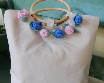 cotton bag with crochet crochet flowers