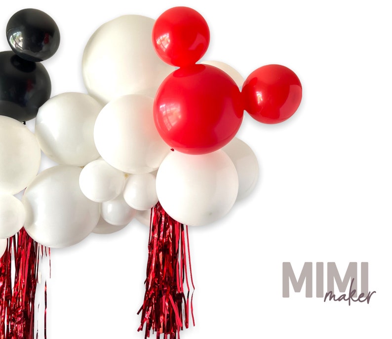 May include: A red and white balloon garland with red streamers. The balloons are arranged in the shape of Mickey Mouse's head.  The garland is perfect for a birthday party or other celebration.