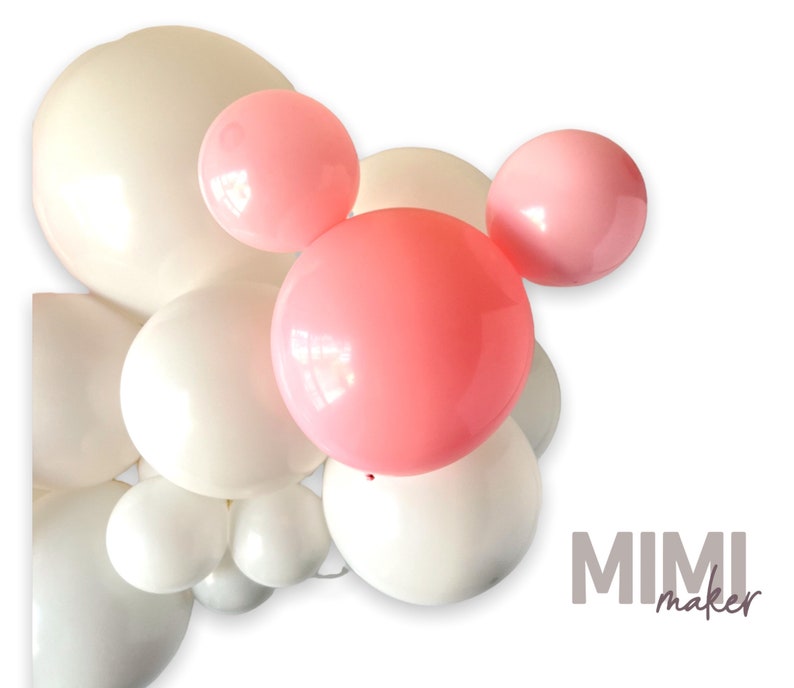 May include: A cluster of white, cream, and pink balloons, arranged in a decorative display. The balloons vary in size, with the largest ones in cream and white. The text "MIMI maker" is visible in the lower right corner.