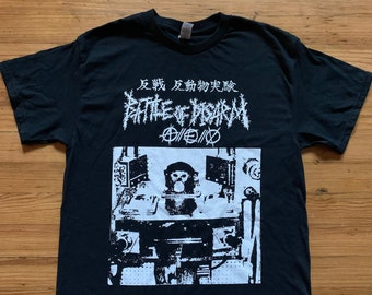 May include: Black t-shirt with a white graphic print of a monkey sitting at a computer with the text "Battle of Disarray" and Japanese characters above the image.