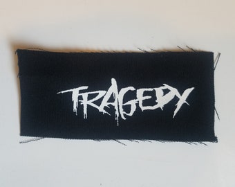 Parche de tela de la tragedia