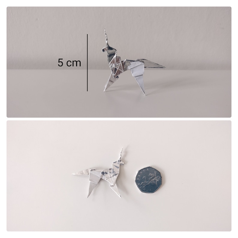 May include: A silver origami unicorn, approximately 5 cm tall, is shown next to a British 50 pence coin for scale.