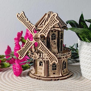 Molino de viento: archivo cortado con láser, modelo SVG 3D de madera con detalles rústicos y personajes.