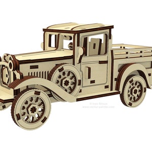 May include: A wooden model kit of a vintage pickup truck. The truck is brown and cream colored with a wooden bed and a detailed interior. The model is unassembled and comes with instructions.