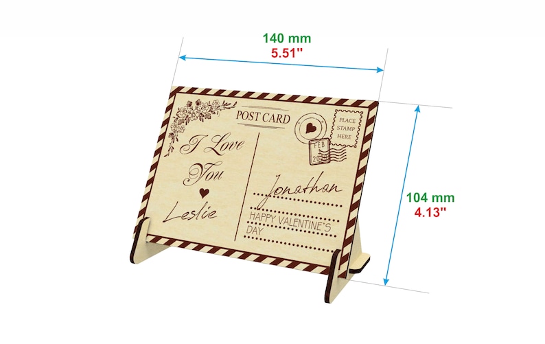 May include: A wooden postcard stand with a vintage design. The postcard features the text "I Love You" and "Happy Valentine's Day". The stand is 140 mm wide and 104 mm tall.
