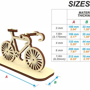 May include: A wooden model of a bicycle with a stand. The model is available in three sizes: 3.94 inches, 4.17 inches, and 8.33 inches. The model is made of wood and has a natural finish.