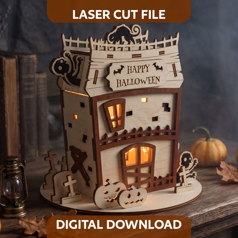 Halloween-themed laser cut plywood zombie house decoration with warm inner lighting, pumpkins, and miniature gravestones.