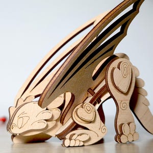 Laser-cut dragon ornament SVG file, perfect for Glowforge and CNC engraving