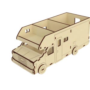 May include: A wooden model of a camper van with a pop-up roof. The model is made of light brown wood and has a detailed interior.