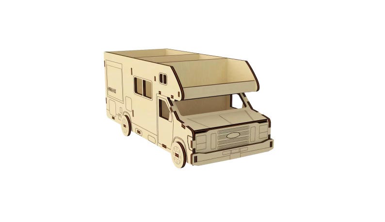 May include: A wooden model of a camper van with a white and brown color scheme. The camper has a raised roof and a Ford logo on the front.