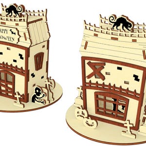 two wooden houses decorated for Halloween, with bats and other spooky elements.