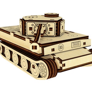 May include: A wooden model of a German Tiger tank. The tank is made of plywood and has a brown and black paint scheme. The tank has a detailed turret and tracks.
