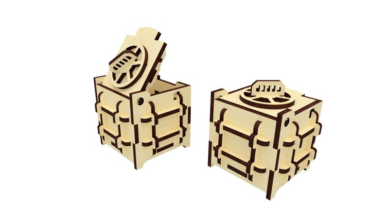 May include: Two wooden boxes with intricate designs, resembling a miniature safe. One box is open, revealing the interior. Both boxes have a circular lid with a decorative design.