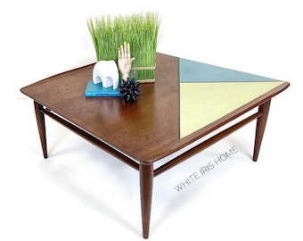 MID CENTURY square walnut coffee table. Bassett artisan line.  painted accent pencil legs surf board edge bespoke MCM