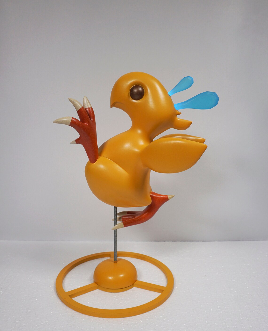 plush chicken with knife