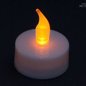 LED tea light with yellow flickering flame image 1