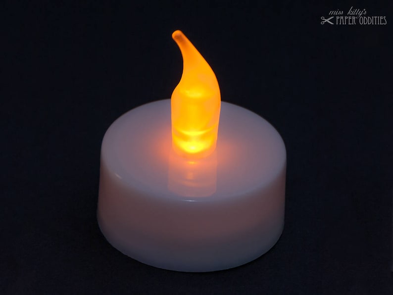 LED tea light with yellow flickering flame image 1