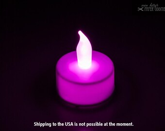 LED tealight with pink flame