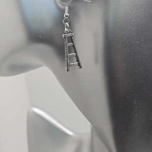 Ladder silver drop earrings.