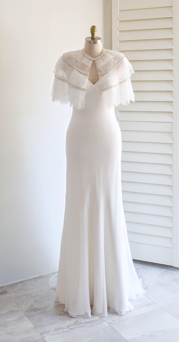 white lace cape dress