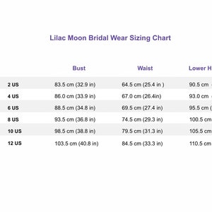 May include: Lilac Moon Bridal Wear Sizing Chart with measurements in inches and centimeters for bust, waist, and lower hips. Sizes are listed in Australian (AU) and US sizes.