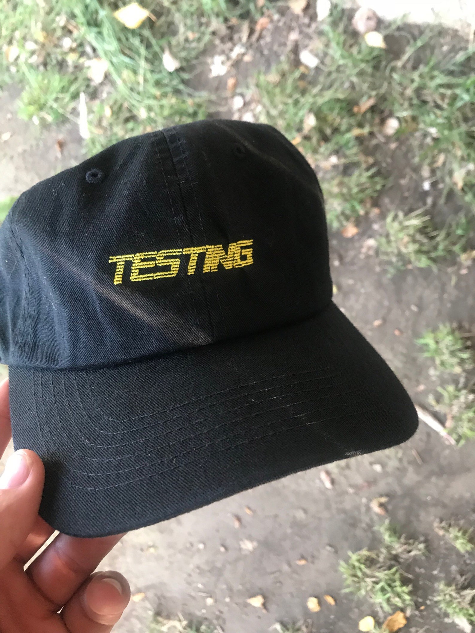 Test hat. ASAP Rocky в кепке. ASAP Rocky мерч. Мерч тестинг асап Рокки. America Rocky кепка.