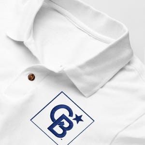Premium Piqué Men&#39;s Polo with embroidered Logo | Premium Polo Shirt | Custom Embroidered Apparel | 100% Ringspun Cotton | Coldwell Banker