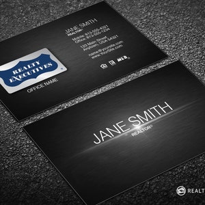 May include: Black and white business card with a silver logo that says "Realty Executives" and the text "Jane Smith, Realtor" with contact information. The card has a brushed metal effect.