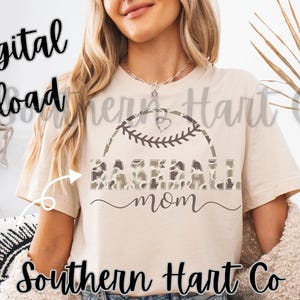 May include: Tan t-shirt with a baseball design and the words "Baseball Mom". The baseball graphic has a camouflage pattern. The words "Png Digital Download" and "Southern Hart Co" are also visible.