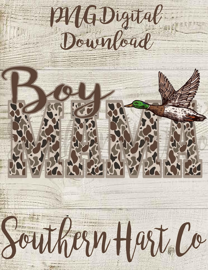 May include: A brown and tan camouflage print design with the words "Boy Mama" in brown text. A green-headed duck with brown and white feathers is flying above the text. The words "Southern Hart Co." are in brown text at the bottom of the design.