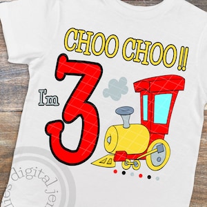 May include: White t-shirt with a red number 3 and a cartoon train with the text "Choo Choo!" printed on it. The train is red and yellow with black wheels. The text "I'm" is printed above the number 3.