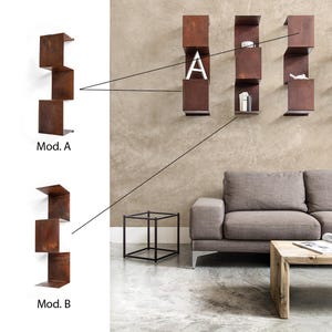 May include: Two different styles of wall-mounted shelves made of rusted metal. The shelves are in a staggered design. The shelves are labeled "Mod. A" and "Mod. B".