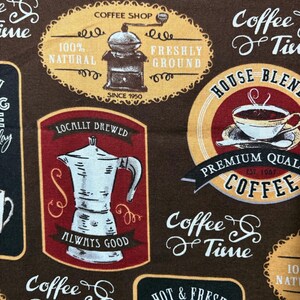 May include: A brown fabric featuring a repeating pattern of coffee-themed graphics and text. Designs include a coffee grinder, a moka pot, and cups of coffee with labels such as "Coffee Shop," "House Blend," "Locally Brewed," and "Morning Coffee."