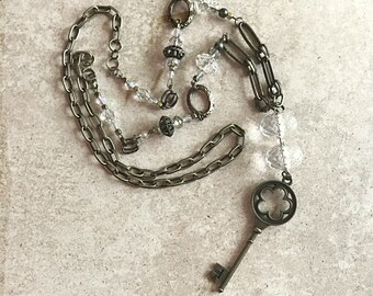 Long crystal and bronze skeleton key bohemian necklace