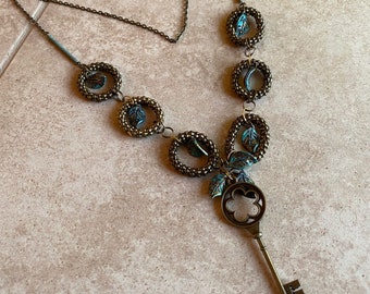 Long bronze and teal leaf necklace with large skeleton key charm // Long necklace with leaf charms and circular beads