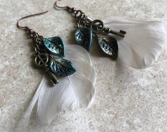 Long dangle feather earrings with key and leaf charms // fishhook feather earrings