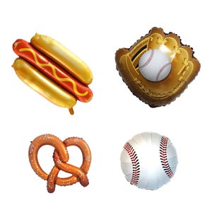 May include: A collection of inflatable food and sports-themed balloons. Includes a hot dog with mustard, a baseball glove with a baseball, a pretzel, and a baseball. The balloons are in various colors, including gold, red, brown, and white.