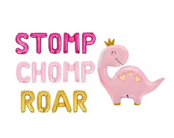 May include: A set of foil balloons featuring the text STOMP in hot pink, CHOMP in light pink, and ROAR in gold. Beside the text is a large, light pink dinosaur balloon wearing a small gold crown, with yellow heart patterns on its back.