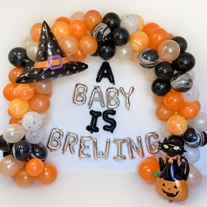 A Baby Is Brewing Balloon Garland Halloween Themed Baby Shower Balloons Halloween Gender Reveal Decor Halloween Baby Shower Decorations