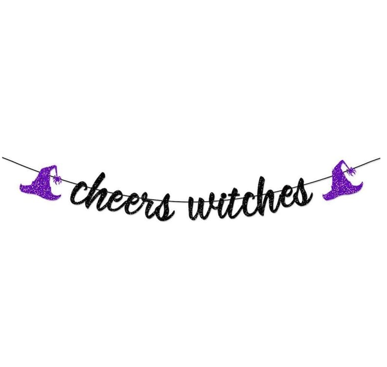 May include: Black glitter banner with the text "cheers witches" and purple glitter witch hats on each end.
