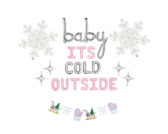 May include: A set of foil balloons and a banner featuring the text baby ITS COLD OUTSIDE in silver and light pink. The display includes two large silver snowflake balloons, four small silver star balloons, and a garland with sleighs and mittens.