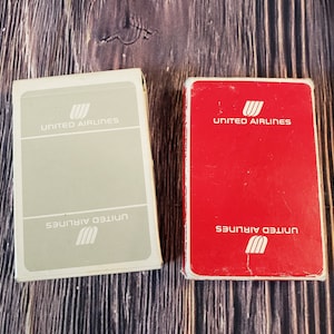 Barajas vintage de cartas de UNITED AIRLINES en la década de 1970
