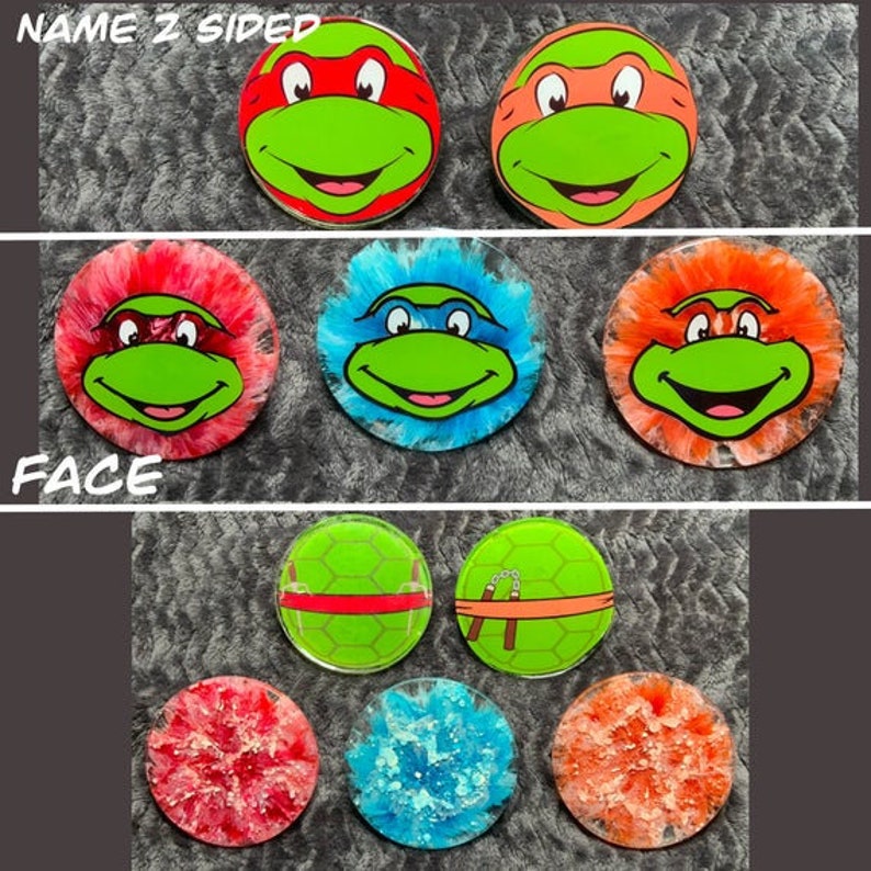 May include: Set of 10 round coasters featuring Teenage Mutant Ninja Turtles characters. The coasters are made of resin and have a variety of designs, including the turtles' faces, their shells, and their weapons. The coasters are perfect for adding a touch of fun to any home.