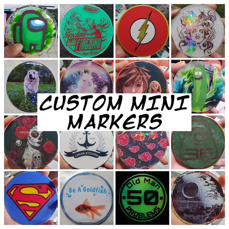 May include: A collection of 12 custom mini markers with various designs. The designs include a green alien, a green and white firebird, a red lightning bolt, a mermaid with a blue tail, a white dog, a galaxy with a unicorn, a video game character, a green pickle, a skull with flowers, an anchor with a rope, a red and white cloud, a green and brown symbol, a red Superman logo, a goldfish, and a green circle with the text "Old Man (50) Problems".