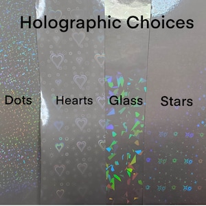 May include: Four samples of holographic vinyl with different patterns: dots, hearts, glass shards, and stars. The text "Holographic Choices" is at the top of the image.