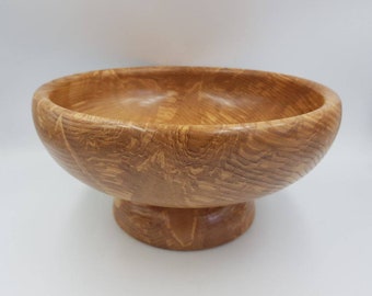 Wood Footed Fruit Bowl.  Wooden fruit bowl made from a beautiful piece of Olive Ash. Very decorative grain patterns. Sustainably sourced
