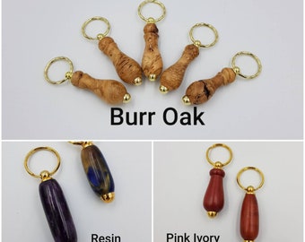 Hand turned keyrings. Pink Ivory, burr oak and coloured Resin. Keyrings. Key fob. Key holder. Woodturned keyring.   Coloured resin keyrings