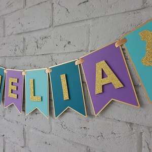 Custom mermaid birthday party banner. Mermaid 1st birthday decorations girl. Mermaid theme baby shower decorations. Purple teal aqua gold.