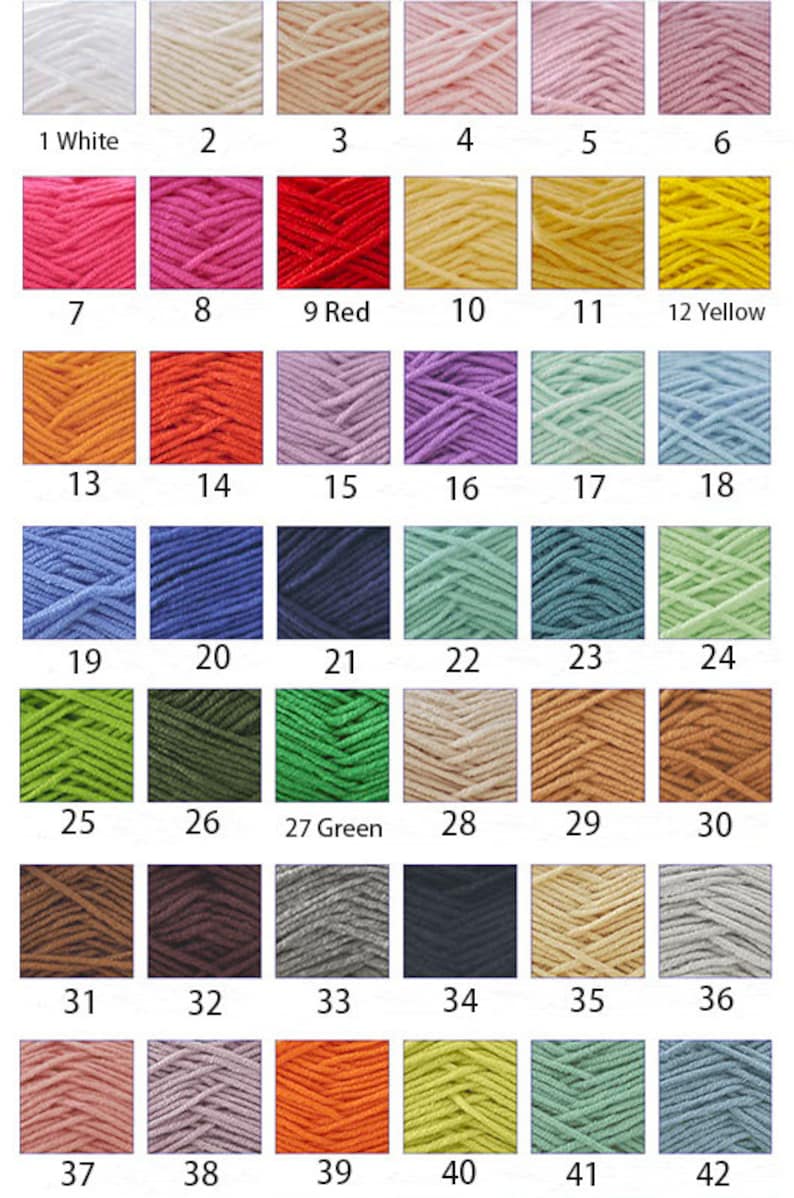 Pode incluir: Uma carta de cores de 42 cores de fio, incluindo branco, vermelho, amarelo, verde, azul, laranja, castanho e cinza. O fio est&aacute; disposto em filas de seis, com cada cor etiquetada com um n&uacute;mero.